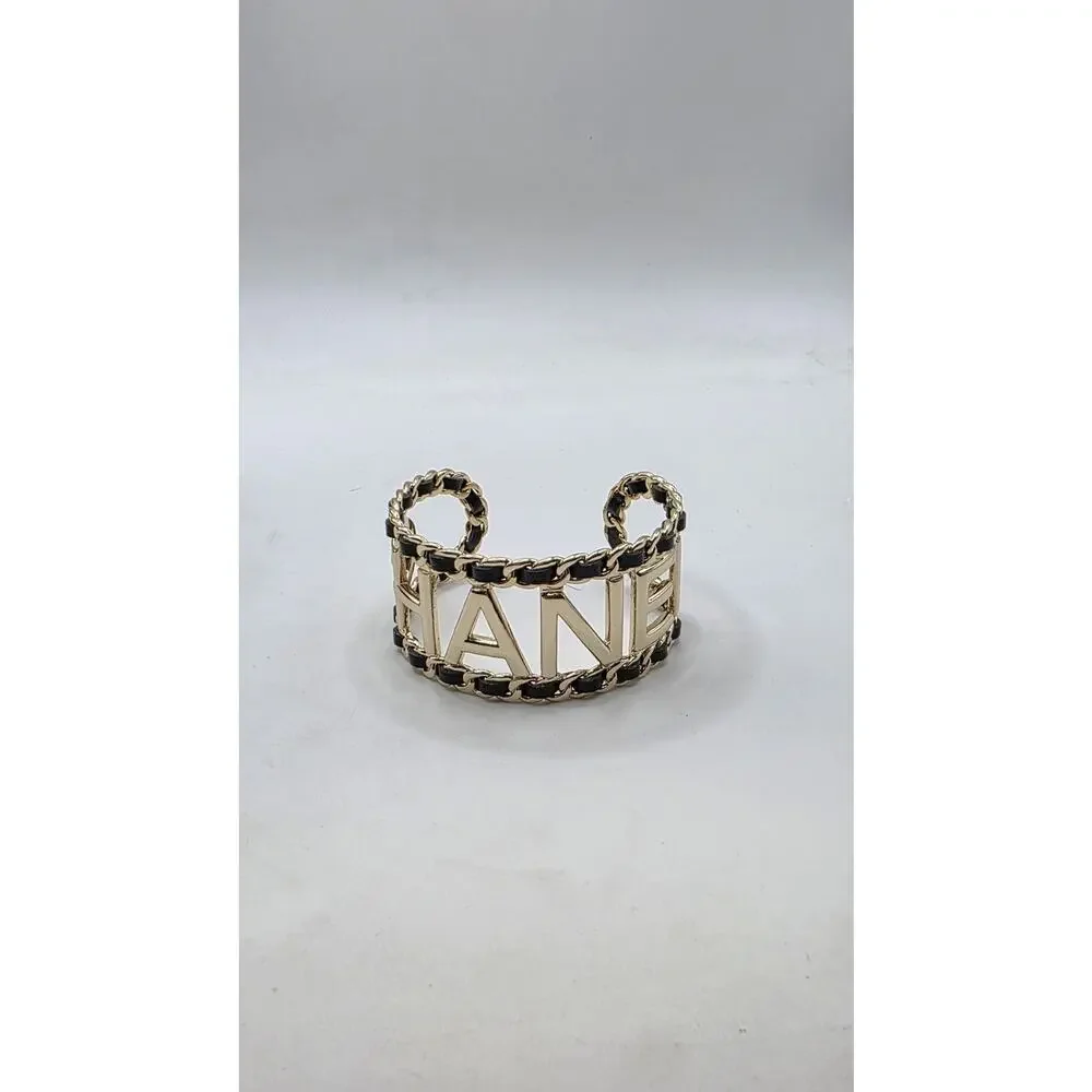 Chanel Gold-tone Leather 'CHANEL' Cuff Bracelet